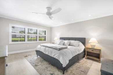 COMPLETELY RENOVATED 1ST-FLOOR CORNER 2br/2bth condo in a lush on Hunters Run Golf and Country Club in Florida - for sale on GolfHomes.com, golf home, golf lot