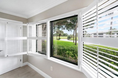 COMPLETELY RENOVATED 1ST-FLOOR CORNER 2br/2bth condo in a lush on Hunters Run Golf and Country Club in Florida - for sale on GolfHomes.com, golf home, golf lot