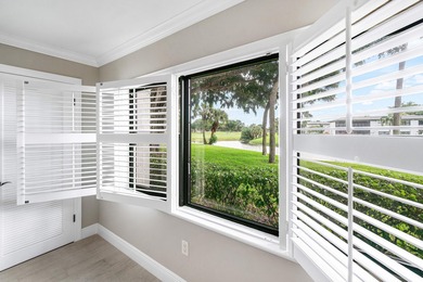 COMPLETELY RENOVATED 1ST-FLOOR CORNER 2br/2bth condo in a lush on Delray Dunes Golf and Country Club in Florida - for sale on GolfHomes.com, golf home, golf lot