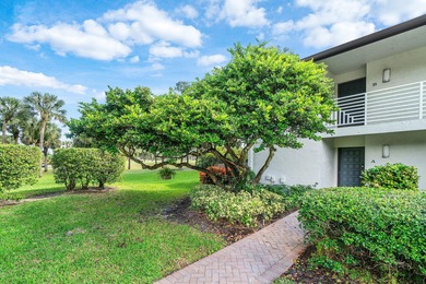 COMPLETELY RENOVATED 1ST-FLOOR CORNER 2br/2bth condo in a lush on Delray Dunes Golf and Country Club in Florida - for sale on GolfHomes.com, golf home, golf lot