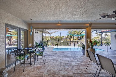 Burnt Store Isles! Beautiful 3-bedroom, 2-bath, 2-car garage on Twin Isles Country Club in Florida - for sale on GolfHomes.com, golf home, golf lot