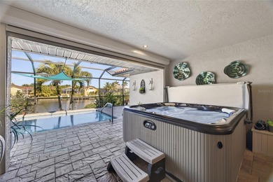 Burnt Store Isles! Beautiful 3-bedroom, 2-bath, 2-car garage on Twin Isles Country Club in Florida - for sale on GolfHomes.com, golf home, golf lot