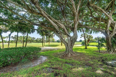 COMPLETELY RENOVATED 1ST-FLOOR CORNER 2br/2bth condo in a lush on Delray Dunes Golf and Country Club in Florida - for sale on GolfHomes.com, golf home, golf lot