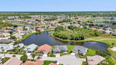 SENSATIONAL WATER VIEW from a MASSIVE enclosed and tiled lanai on Kings Gate Golf Club in Florida - for sale on GolfHomes.com, golf home, golf lot