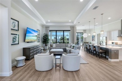 Sophisticated, serene, contemporary, and warm, this absolutely on The Golf Club At Fiddlers Creek in Florida - for sale on GolfHomes.com, golf home, golf lot