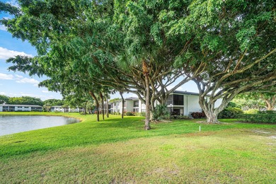 COMPLETELY RENOVATED 1ST-FLOOR CORNER 2br/2bth condo in a lush on Delray Dunes Golf and Country Club in Florida - for sale on GolfHomes.com, golf home, golf lot