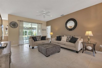 SENSATIONAL WATER VIEW from a MASSIVE enclosed and tiled lanai on Kings Gate Golf Club in Florida - for sale on GolfHomes.com, golf home, golf lot