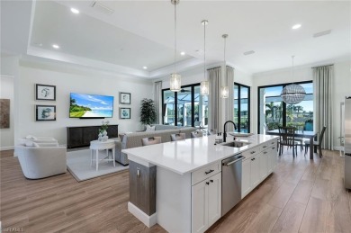 Sophisticated, serene, contemporary, and warm, this absolutely on The Golf Club At Fiddlers Creek in Florida - for sale on GolfHomes.com, golf home, golf lot