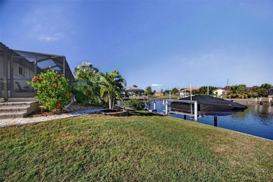 Burnt Store Isles! Beautiful 3-bedroom, 2-bath, 2-car garage on Twin Isles Country Club in Florida - for sale on GolfHomes.com, golf home, golf lot