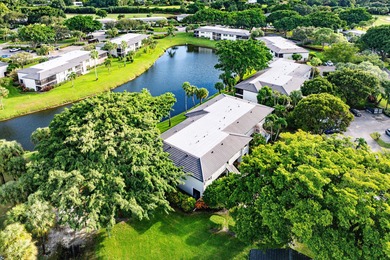 COMPLETELY RENOVATED 1ST-FLOOR CORNER 2br/2bth condo in a lush on Delray Dunes Golf and Country Club in Florida - for sale on GolfHomes.com, golf home, golf lot