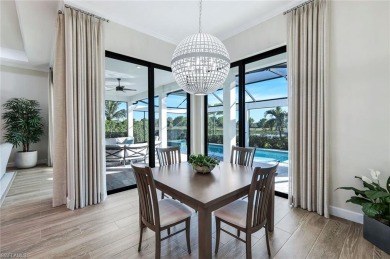 Sophisticated, serene, contemporary, and warm, this absolutely on The Golf Club At Fiddlers Creek in Florida - for sale on GolfHomes.com, golf home, golf lot