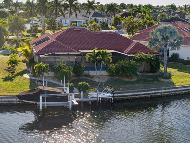 Burnt Store Isles! Beautiful 3-bedroom, 2-bath, 2-car garage on Twin Isles Country Club in Florida - for sale on GolfHomes.com, golf home, golf lot