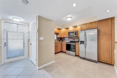 Welcome to this BEAUTIFUL 2/2 FIRST-FLOOR UNIT, located ON THE on Hollybrook Golf and Tennis Club  in Florida - for sale on GolfHomes.com, golf home, golf lot
