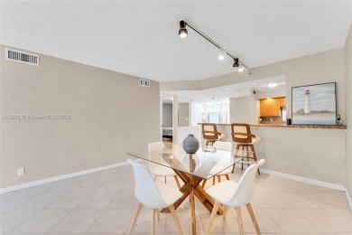 Welcome to this BEAUTIFUL 2/2 FIRST-FLOOR UNIT, located ON THE on Hollybrook Golf and Tennis Club  in Florida - for sale on GolfHomes.com, golf home, golf lot
