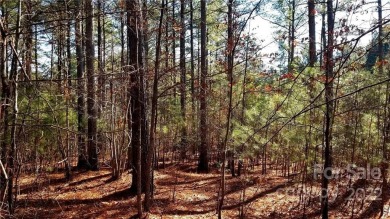 1.05 acre, wooded interior lot in the Anchors Landing on Granada Farms Country Club in North Carolina - for sale on GolfHomes.com, golf home, golf lot