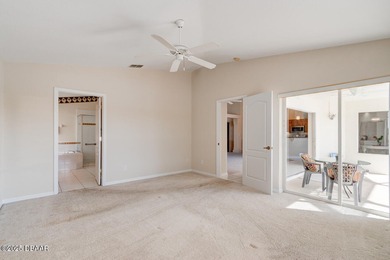 This stunning 3-bedroom plus den/office , 2-bath home is located on Spruce Creek Golf Club in Florida - for sale on GolfHomes.com, golf home, golf lot