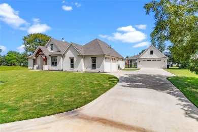 Take a look at this beautiful home in Star Harbor. This home on Star Harbor Golf Club in Texas - for sale on GolfHomes.com, golf home, golf lot