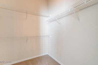 This stunning 3-bedroom plus den/office , 2-bath home is located on Spruce Creek Golf Club in Florida - for sale on GolfHomes.com, golf home, golf lot