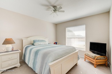 This stunning 3-bedroom plus den/office , 2-bath home is located on Spruce Creek Golf Club in Florida - for sale on GolfHomes.com, golf home, golf lot