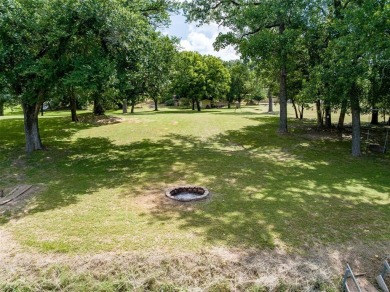 Come experience the tranquility of the Brazos River from your on Pecan Plantation Country Club in Texas - for sale on GolfHomes.com, golf home, golf lot