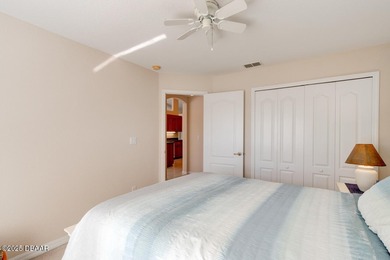 This stunning 3-bedroom plus den/office , 2-bath home is located on Spruce Creek Golf Club in Florida - for sale on GolfHomes.com, golf home, golf lot