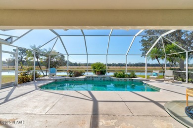 This stunning 3-bedroom plus den/office , 2-bath home is located on Spruce Creek Golf Club in Florida - for sale on GolfHomes.com, golf home, golf lot