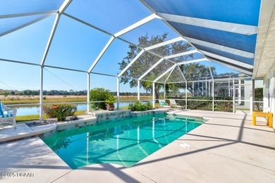 This stunning 3-bedroom plus den/office , 2-bath home is located on Spruce Creek Golf Club in Florida - for sale on GolfHomes.com, golf home, golf lot