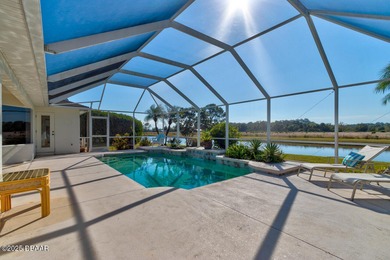 This stunning 3-bedroom plus den/office , 2-bath home is located on Spruce Creek Golf Club in Florida - for sale on GolfHomes.com, golf home, golf lot