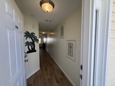 STEPS TO THE BEACH | TURNKEY RENTAL OPPORTUNITY! Welcome to 775 on Sandpiper Cove Golf Course in Florida - for sale on GolfHomes.com, golf home, golf lot