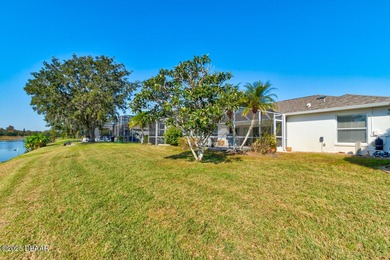 This stunning 3-bedroom plus den/office , 2-bath home is located on Spruce Creek Golf Club in Florida - for sale on GolfHomes.com, golf home, golf lot