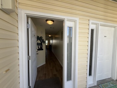 STEPS TO THE BEACH | TURNKEY RENTAL OPPORTUNITY! Welcome to 775 on Sandpiper Cove Golf Course in Florida - for sale on GolfHomes.com, golf home, golf lot