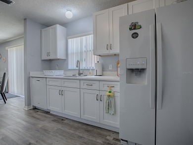 Welcome to a delightful retreat in the vibrant heart of The on El Diablo Executive Golf Course in Florida - for sale on GolfHomes.com, golf home, golf lot