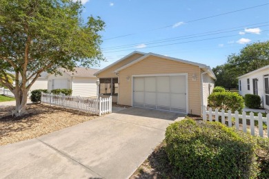 Tucked away in the Village of Alhambra, this charming 2 Bedroom on The Links of Spruce Creek in Florida - for sale on GolfHomes.com, golf home, golf lot