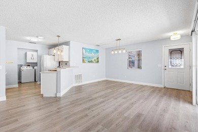 Tucked away in the Village of Alhambra, this charming 2 Bedroom on The Links of Spruce Creek in Florida - for sale on GolfHomes.com, golf home, golf lot