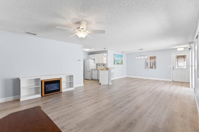 Tucked away in the Village of Alhambra, this charming 2 Bedroom on The Links of Spruce Creek in Florida - for sale on GolfHomes.com, golf home, golf lot