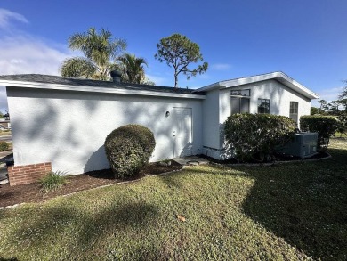 Lot Rent for this home is $1,342.00/monthly. Beautiful stucco on Del Tura Golf and Country Club in Florida - for sale on GolfHomes.com, golf home, golf lot