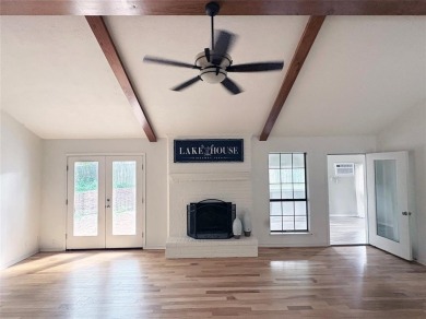 Stunning 3 Bed, 2 Bath Brick Home with J-Garage + Flex Room on on Hide-A-Way Lake Golf Course in Texas - for sale on GolfHomes.com, golf home, golf lot