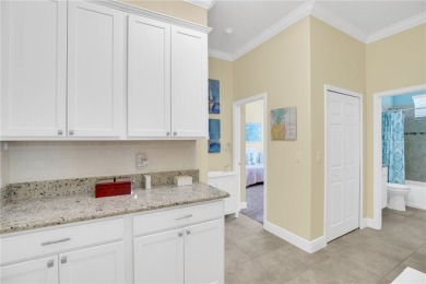 Remarkable 3/2.5/2 + den with a southern exposed screened in on The Club At Pointe West in Florida - for sale on GolfHomes.com, golf home, golf lot