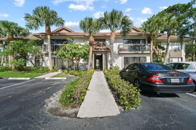 THE LOWEST PRICED GROUND FLOOR UNIT IN DUNBAR WOODS! UPDATED AND on PGA National Golf Club in Florida - for sale on GolfHomes.com, golf home, golf lot