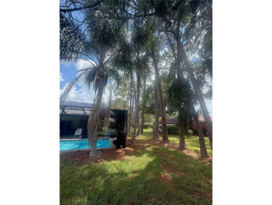 Rare FOUR-bedroom, corner lot home in the ever-desired Tarpon on Tarpon Woods Golf Club in Florida - for sale on GolfHomes.com, golf home, golf lot