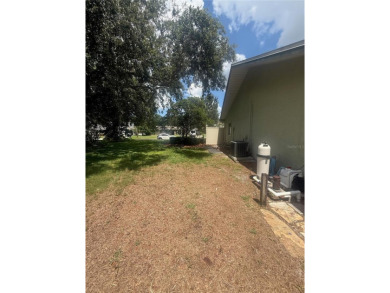 Rare FOUR-bedroom, corner lot home in the ever-desired Tarpon on Tarpon Woods Golf Club in Florida - for sale on GolfHomes.com, golf home, golf lot
