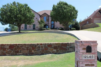 Discover this delightful home tucked away in a tranquil on The Golf Club at Resort Eagle Mountain Lake in Texas - for sale on GolfHomes.com, golf home, golf lot