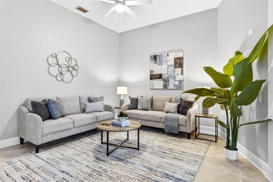 Situated on a rare 10,000+ sq ft lot in Westchase, this heated on Westchase Golf Club in Florida - for sale on GolfHomes.com, golf home, golf lot