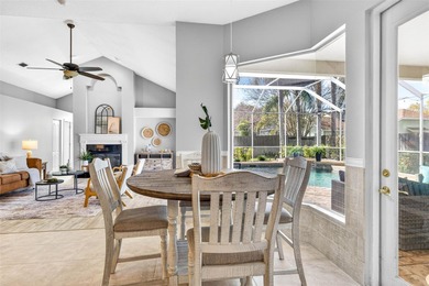 Situated on a rare 10,000+ sq ft lot in Westchase, this heated on Westchase Golf Club in Florida - for sale on GolfHomes.com, golf home, golf lot