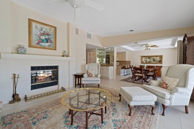 Watch the golfers putt from the extra large tiled patio of this on Chaparral Country Club in California - for sale on GolfHomes.com, golf home, golf lot