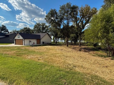 Open water lot on almost half acre in newer gated community on on Cedar Creek Country Club in Texas - for sale on GolfHomes.com, golf home, golf lot