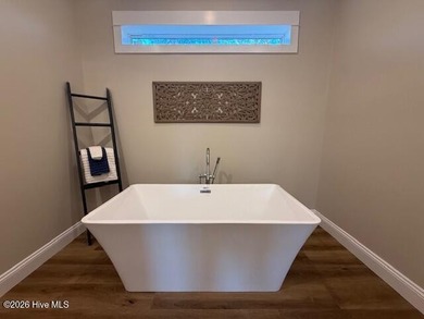 A stunning new construction ranch style home located right on on Minnesott Golf and Country Club in North Carolina - for sale on GolfHomes.com, golf home, golf lot