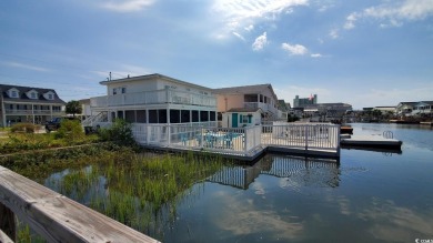 This Charming Multi Family 5 Bedroom,5 bath home nestled on the on Tidewater Golf Club and Plantation in South Carolina - for sale on GolfHomes.com, golf home, golf lot