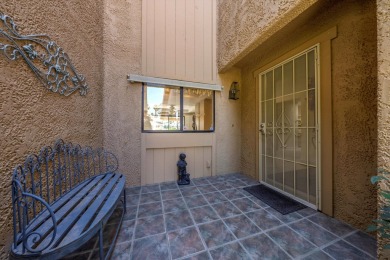 Watch the golfers putt from the extra large tiled patio of this on Chaparral Country Club in California - for sale on GolfHomes.com, golf home, golf lot