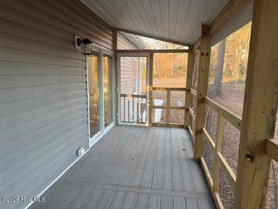 A stunning new construction ranch style home located right on on Minnesott Golf and Country Club in North Carolina - for sale on GolfHomes.com, golf home, golf lot